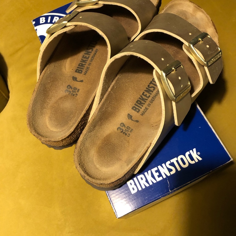 Birkenstock Gold Sandals with Adjustable Straps and Contoured Footbed